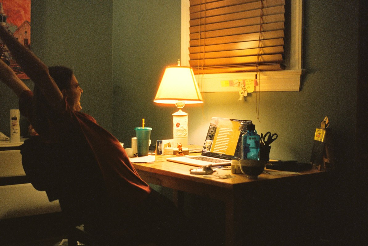 Modern ergonomic workspace with proper lighting and equipment setup